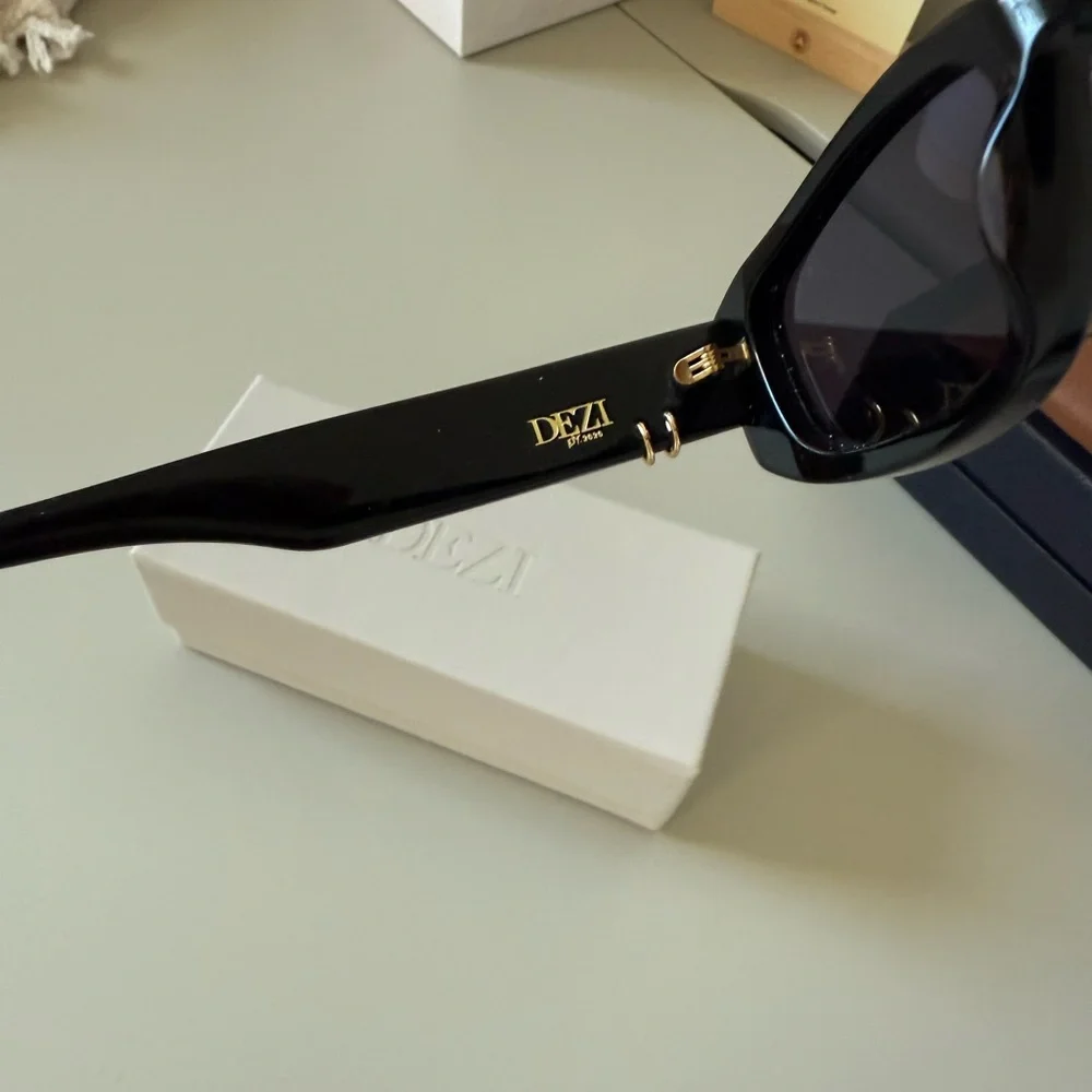 DEZI Cuffed Black Rectangular Sunglasses with Gold detail - Picture 8 of 8
